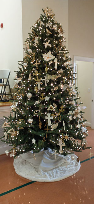 The Chrismon Tree lit up after the congregation finished decorating it